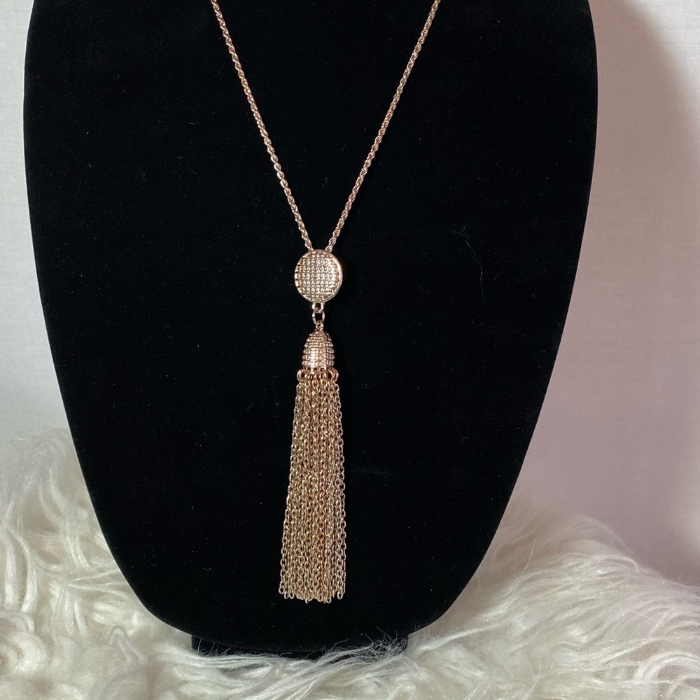 Long necklace with tassel pendant. Copper tones
